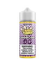 A 120ml bottle of Blueberry Crepe flavored e-liquid by Loaded. The bottle is white with a purple label and includes product information and warnings about nicotine content.